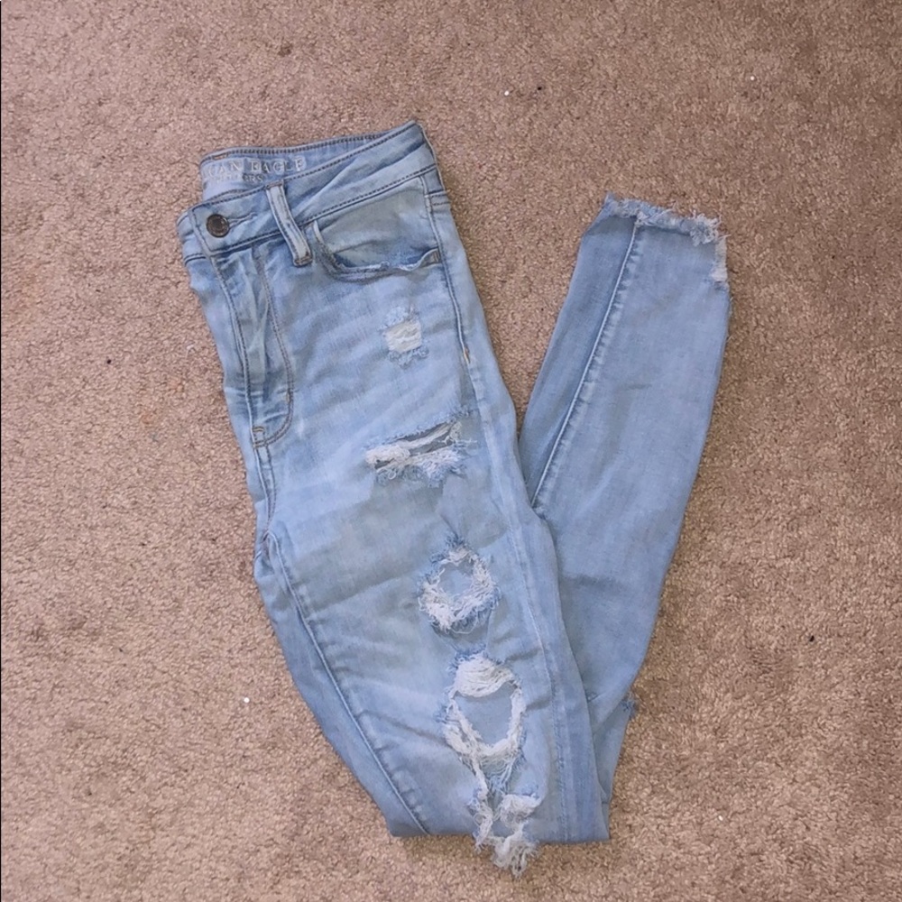 Ripped light wash denim jeans